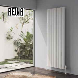 Reina Loco Vertical Double Aluminium Radiator in White installed in a modern room with large windows